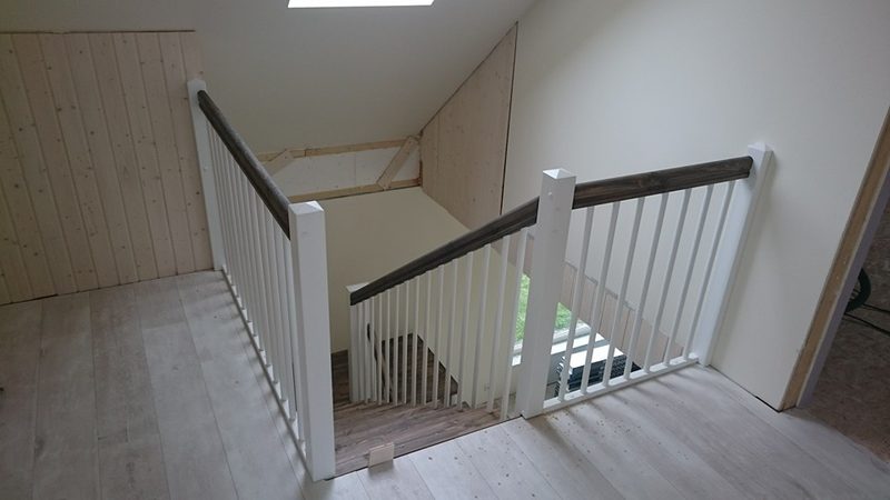 Turned balusters and wooden handrail
