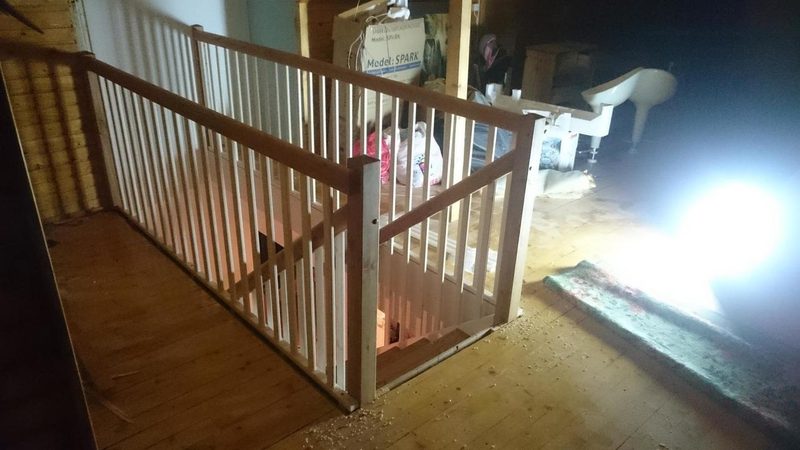 Glass railing on a U-shaped staircase